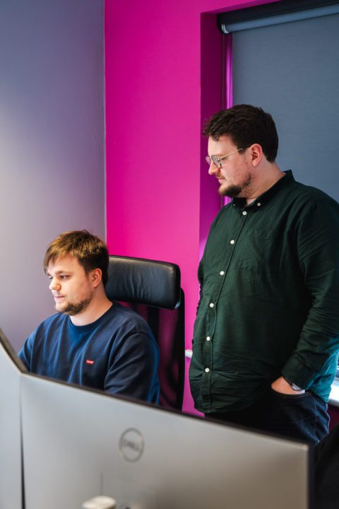 Jake and Kyron looking at a computer