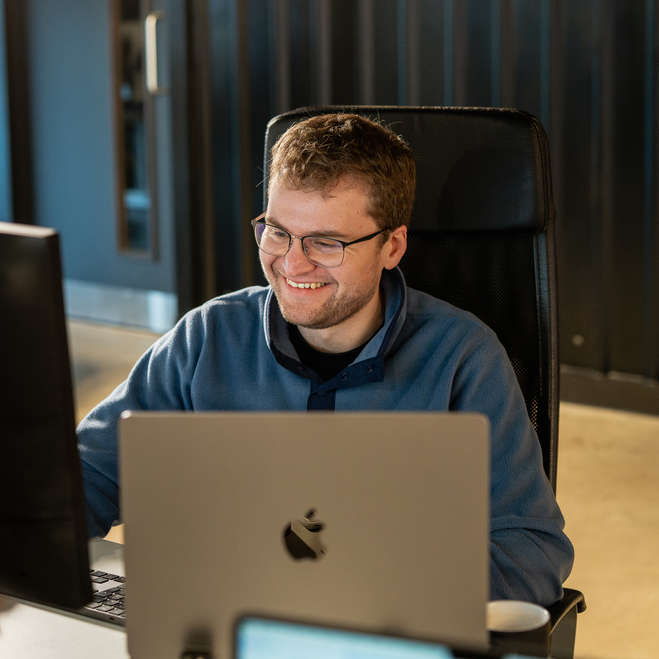 A Reech team member working on a marketing strategy